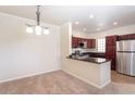 Modern open layout showcasing the kitchen with stainless steel appliances at 16013 S Desert Foothills Pkwy # 2077, Phoenix, AZ 85048