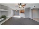 Cozy living room with open floor plan showcasing the connected dining and kitchen areas at 16631 E El Lago Blvd # 214, Fountain Hills, AZ 85268