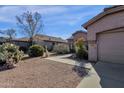 Charming single-story home with low maintenance desert landscaping, neutral palette and a private two-car garage at 4658 S Rufino Ln, Gold Canyon, AZ 85118