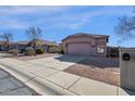 Charming single-story home with low maintenance desert landscaping and a private two-car garage at 4658 S Rufino Ln, Gold Canyon, AZ 85118