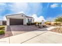 A delightful single-Gathering home featuring a brick driveway and an attached garage at 5624 S Winchester --, Mesa, AZ 85212