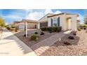 Beautiful exterior view showcasing a home with manicured landscaping and a welcoming entrance at 5624 S Winchester --, Mesa, AZ 85212