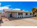 Single-story home featuring a covered carport and low-maintenance desert landscaping at 1117 W Mesquite St, Chandler, AZ 85224