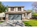 Charming two-story home featuring an attached two-car garage and well-manicured lawn at 3708 E Bruce Ave, Gilbert, AZ 85234