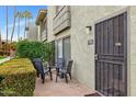 Cozy patio with furniture outside unit 116 for relaxing outdoors at 4620 N 68Th St # 116, Scottsdale, AZ 85251