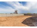 Expansive backyard with block wall, providing a blank canvas for landscaping and outdoor enjoyment at 4821 S 12Th St, Phoenix, AZ 85040