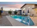 Backyard pool with lounge chairs, providing a private oasis for relaxation at 8307 E Montebello Ave, Scottsdale, AZ 85250