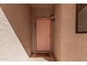 Exterior shot showing the unit front door with a light fixture at 9151 W Greenway Rd # 277, Peoria, AZ 85381