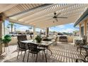 Spacious covered patio with ample seating, perfect for outdoor dining and relaxation at 1056 S 79Th St, Mesa, AZ 85208