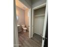 Bright half bathroom with a pedestal sink and neutral paint at 1743 W Pollack St, Phoenix, AZ 85041