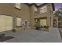 Spacious backyard featuring a water feature, a balcony, and concrete patio at 18256 W Carol Ave, Waddell, AZ 85355