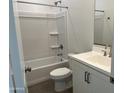 Clean bathroom features a shower-tub combo, white vanity, and modern fixtures at 7654 W Tether Trl, Peoria, AZ 85383