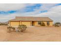 Charming single-story home with a three car garage and neutral exterior paint at 1600 W Ivar Rd, San Tan Valley, AZ 85144
