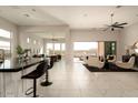 Open concept living area with marble floors and seamless flow to the outdoor spaces at 12245 E Clinton St, Scottsdale, AZ 85259