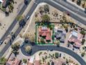 Stunning aerial view of a home featuring a red tile roof, solar panels and a private pool at 18400 N Deer Grass Ct, Surprise, AZ 85374