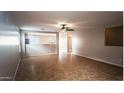 Spacious living room featuring tile floors and abundant natural light at 22756 W Papago St, Buckeye, AZ 85326