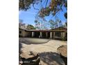 Inviting outdoor space with a refreshing pool, spacious patio, and a serene backyard setting at 146 W Marshall Ave, Phoenix, AZ 85013