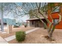 Charming two-story house with a welcoming covered porch and desert-friendly landscaping at 16350 N Desert Sage St, Surprise, AZ 85378