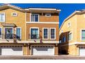 Stylish townhome showcasing a two-car garage and a cozy balcony at 2450 W Glenrosa Ave # 41, Phoenix, AZ 85015