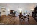Spacious living room with wood flooring and a view of the outdoor patio at 3777 N 162Nd Ave, Goodyear, AZ 85395