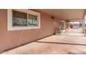 Covered patio area provides ample space for outdoor seating and relaxation at 7714 E Calypso Ave, Mesa, AZ 85208