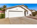 Charming single-story home with desert landscaping, a two-car garage, and a welcoming front entrance at 4436 W Morrow Dr, Glendale, AZ 85308