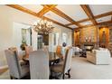 Elegant dining area with fireplace and cozy seating at 6626 E Oberlin Way, Scottsdale, AZ 85266