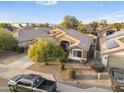 Aerial view of the exterior of a single-story home, showcasing the landscaping and neighborhood at 8630 W Apache St, Tolleson, AZ 85353