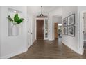 Bright entryway featuring wood flooring and a decorative niche at 17429 E Via Del Oro --, Fountain Hills, AZ 85268