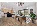 Open-concept living room with a ceiling fan and lots of natural light at 17429 E Via Del Oro --, Fountain Hills, AZ 85268