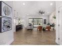Open-concept living room with hardwood floors and modern decor at 17429 E Via Del Oro --, Fountain Hills, AZ 85268