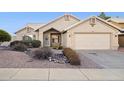 Charming front yard with desert landscaping and a well-maintained exterior at 30663 N 44Th St, Cave Creek, AZ 85331