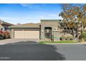Charming single-story home with a stone facade, two-car garage, and well-maintained landscaping at 6426 N 27Th St, Phoenix, AZ 85016