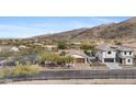 Lovely home in a well-planned community with mountain views and mature trees at 9001 S 18Th Way, Phoenix, AZ 85042