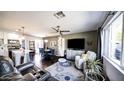 Comfortable living room featuring a dining area, modern decor, and an inviting seating arrangement at 1207 E Alice Ave, Phoenix, AZ 85020