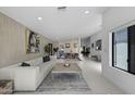 Spacious living area featuring stylish decor, neutral tones and an open layout at 4748 E Redfield Rd, Phoenix, AZ 85032