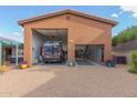 Large garage with a high ceiling, storage, and space for a RV or boat at 508 N Sierra Vista Dr, Wickenburg, AZ 85390