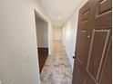 Welcoming entryway with neutral tile flooring and fresh paint leading to various living areas at 10633 N 46Th Ave, Glendale, AZ 85304