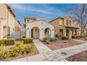 Charming two-story home with a well-manicured front yard and inviting curb appeal at 1088 S Storment Ln, Gilbert, AZ 85296