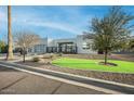 Attractive modern home featuring xeriscaping and well maintained artificial turf at 3001 E Mulberry Dr, Phoenix, AZ 85016