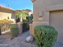 Inviting entryway with brick path, desert landscaping, and private courtyard at 13139 N Northstar Dr, Fountain Hills, AZ 85268