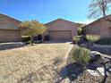 Charming single-story home with brick driveway and tidy desert landscaping at 13139 N Northstar Dr, Fountain Hills, AZ 85268