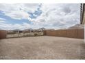 Large backyard with block fence, ready for landscaping and outdoor living enhancements at 21291 W Edgemont Ave, Buckeye, AZ 85396