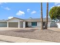 View of the home showcasing the desert landscaping and the exterior architecture at 4612 S Dorsey Ln, Tempe, AZ 85282