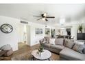 Inviting living room with a ceiling fan, neutral colors, and wood flooring at 1504 W 6Th St, Mesa, AZ 85201