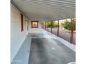 Long covered carport attached to the house offers shaded parking and outdoor living at 3160 E Main St # 72, Mesa, AZ 85213