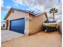 Detached garage, boat parking, and neutral stucco siding at 502 N 110Th St, Mesa, AZ 85207