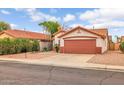Well-kept single-story home with a two-car garage and desert landscaping at 8139 E Osage Ave, Mesa, AZ 85212