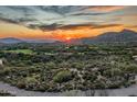 Scenic sunset view overlooking the desert landscape with mountains in the distance at 10020 E Relic Rock Rd # 18, Scottsdale, AZ 85262