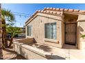 Inviting home exterior with a tiled roof, neutral stucco, and a well-maintained yard at 726 S Nebraska St # 91, Chandler, AZ 85225